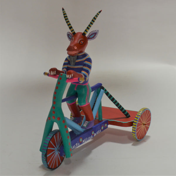Martin Melchor - Hand Carved Goat on a Tricycle