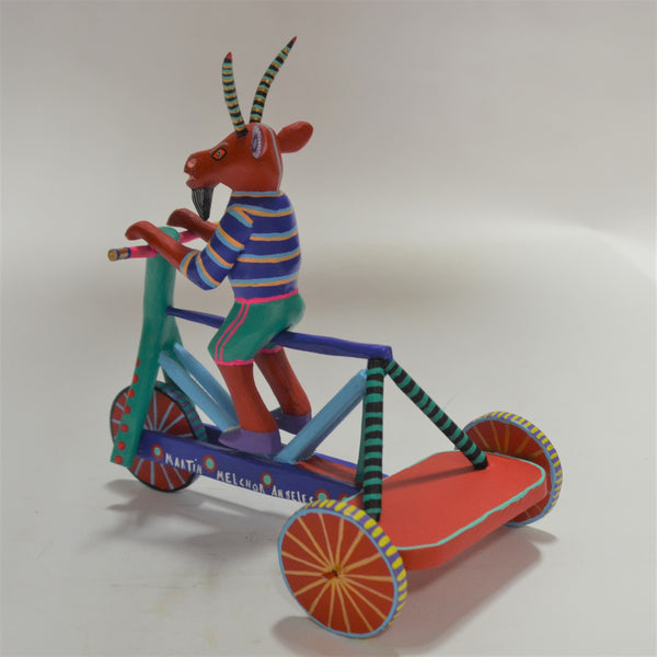 Martin Melchor - Hand Carved Goat on a Tricycle